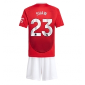 Manchester United Luke Shaw #23 Thuis tenue voor kinderen 2024-25 Korte Mouwen (+ broek)